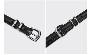 Detail of black leather belt with silver pin buckle and dual textured metal loops