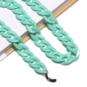 Close-up of mint green acrylic glasses chain with large oval links and rubber loops