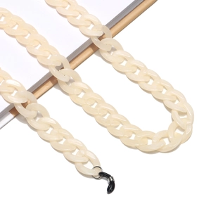 Detail of cream acrylic eyeglass chain with durable links and non-slip rubber loop
