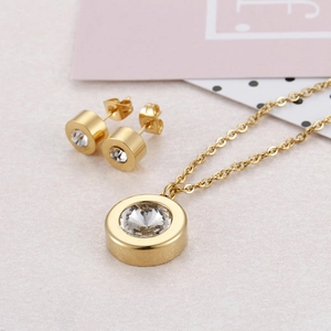Gold titanium steel jewelry set featuring a round zircon necklace and matching stud earrings