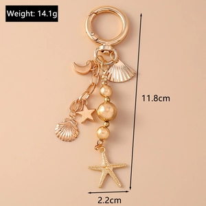 Detailed size view of gold starfish moon keychain with 11.8cm length measurement