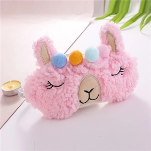 Pink plush alpaca sleep mask with colorful pom-poms and soft fleece material
