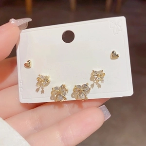 Elegant s925 silver stud earring set with gold heart and zircon bowknot designs