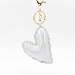 Heart-shaped laser holographic keychain with silver reflective finish and gold clasp