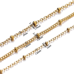 Detail view of gold-plated stainless steel chains with bead accents and size measurements
