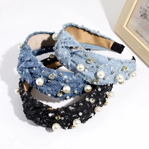 Knotted denim headband with pearls and rhinestones in dark blue, light blue, and black