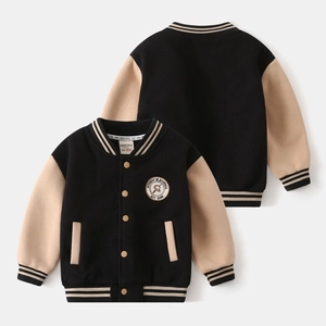 Close-up of boys' baseball jacket details showing rib-knit stripes and embroidery