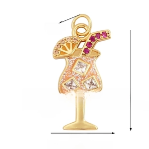 Detailed cocktail glass charm in gold with pink crystals and dimensions 22mm x 14mm
