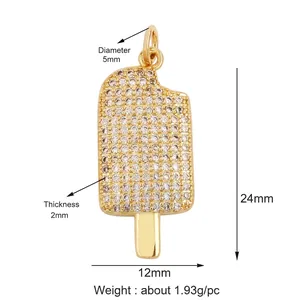 Detailed view of ice cream pendant charm in gold brass with micro-set zircon stones
