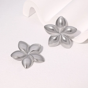 Elegant silver flower stud earrings with metallic stripe texture in minimalist design