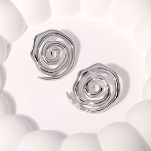 Minimalist silver spiral stud earrings in a sleek stainless steel design for women