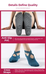 Detail of cotton yoga socks with PVC non-slip dots and ballet-style criss-cross straps