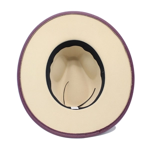 Detail view of the fedora hat interior with purple and beige colors and adjustable drawstring