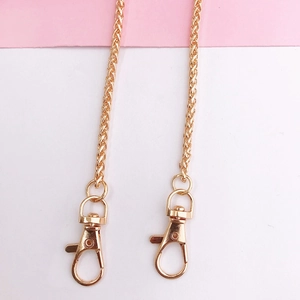 Close-up of a 110cm polished gold metal chain strap with secure lobster clasps