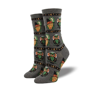 Creative Halloween crew socks featuring owl and witch patterns in grey cotton fabric