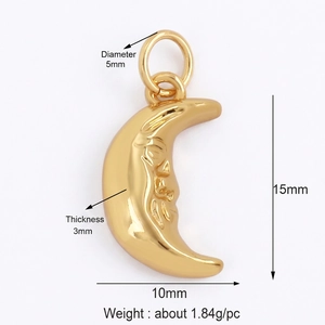 Detailed view of gold plated moon pendant with face relief and size dimensions