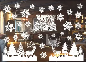 Detailed view of white snowflake and reindeer window decals for Christmas decor