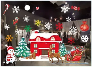 Detailed Christmas window stickers with Santa, snowman, and snowflakes on shop glass
