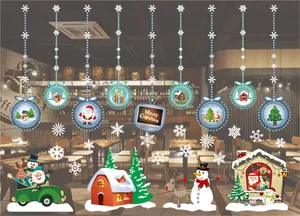 Detailed view of colorful Christmas window stickers with Santa, snowman and elk motifs