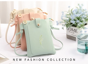 Three mini PU leather phone crossbody bags in green, pink and beige with gold metal buckles