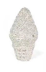 Macro shot of silver rhinestone ice cream cone clutch with sparkling crystal texture