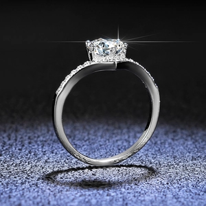 Macro shot of a classic six-prong moissanite ring with a brilliant sparkling star effect
