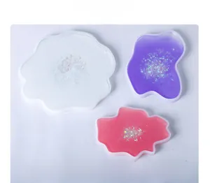 Three-piece set of irregular resin silicone molds in translucent purple and pink glitter