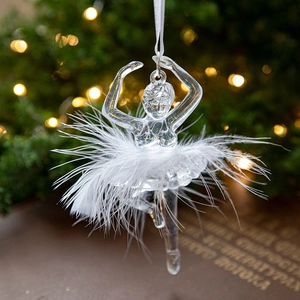 Elegant clear acrylic ballet dancer ornament with white feather tutu on a Christmas tree
