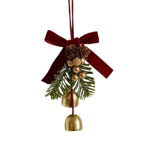 Christmas tree hanging ornament with red velvet bow pine cones and golden bells