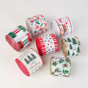 Set of seven Christmas ribbons with gingerbread and reindeer prints on a white background