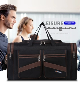 Detail view of the black Oxford travel bag with M SPORT logo and brown striped strap