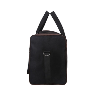 Close-up of black travel bag side showing durable fabric, brown piping, and silver D-ring