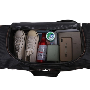 Large black oxford travel duffel bag shown from top view with ample interior storage space
