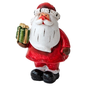 Festive Santa Claus figurine holding a green gift box for Christmas desktop decoration