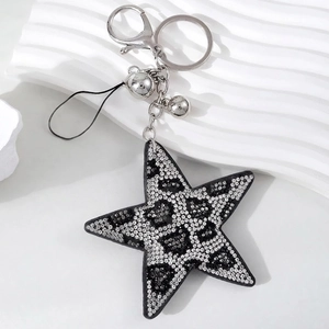 Star-shaped rhinestone keychain with leopard print pattern and silver metal clasp and bells