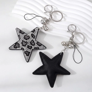 Star-shaped rhinestone keychain set with leopard print and black leather details