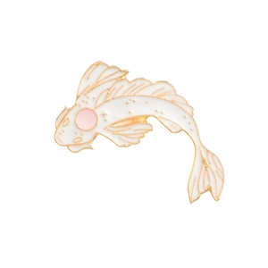 Macro detail of a white enamel koi fish brooch with elegant gold metallic outlines