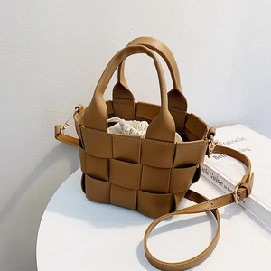 Brown woven texture mini bucket bag with drawstring liner and detachable shoulder strap