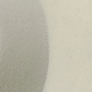 Detailed macro view of the stitching and high-quality wool felt texture of the white hat