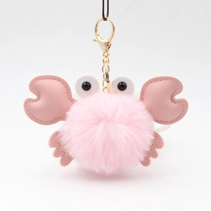 Cute pink plush crab keychain with gold metal clasp and soft faux leather accents