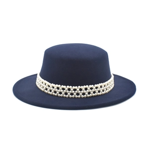 Navy blue flat top wool felt boater hat with decorative white pearl woven band for women