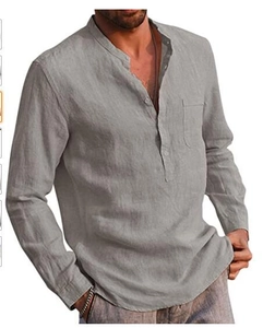 Detail of grey men's linen long sleeve shirt featuring a mandarin collar and chest pocket