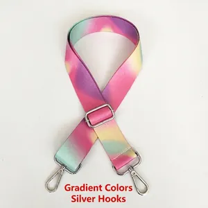 Detail of rainbow gradient replacement bag strap with polished silver metal swivel hooks