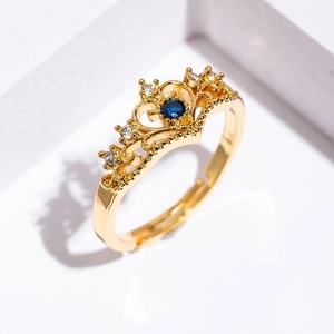 Adjustable golden crown ring with sparkling blue and clear cubic zirconia gemstones