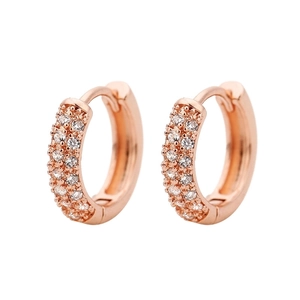 Detail of rose gold hoop earrings with double row micro-paved cubic zirconia