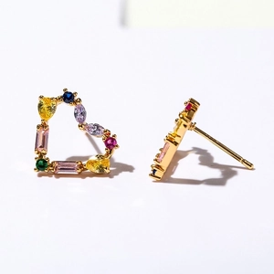 Golden heart-shaped studs with vibrant multi-color zircon stones on white background