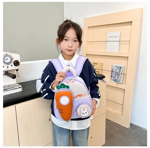 Detail view of purple toddler backpack featuring 3D carrot pocket and bunny design
