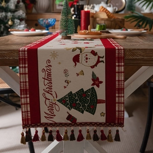 Beige Christmas table runner with red plaid patterns and Merry Christmas text decor