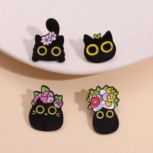 Cute black cat enamel pin set with colorful eyes and floral accents for bags and clothes