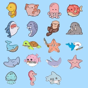 Cartoon ocean world metal enamel pins set with cute sea creatures like whale and starfish